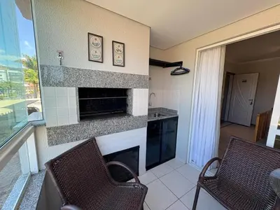 Uma área de estar em cód 154 - Excelente apartamento apenas 300m do mar