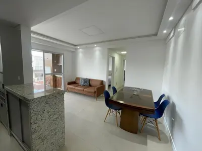 Uma área de estar em Cód 157 - Apartamento a apenas 100 metros do mar!