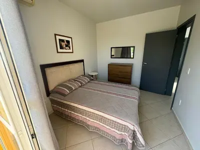 Uma cama ou camas num quarto em Cód 11 - Excelente casa localizada á 180m do mar