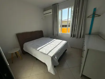 Uma cama ou camas num quarto em Cód 11 - Excelente casa localizada á 180m do mar