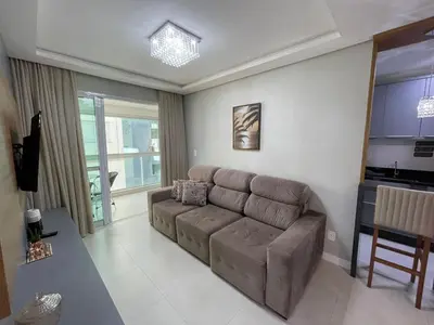 Uma área de estar em Cód 121 - Apartamento á 280m do mar