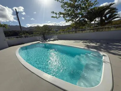 A piscina em ou perto de Cód 78 - Belo apartamento à 80m do mar