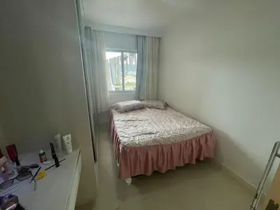 Uma cama ou camas num quarto em Cód 79 - Apto com hidromassagem e vista mar