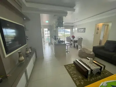 Uma televisão e/ou sistema de entretenimento em Cód 79 - Apto com hidromassagem e vista mar