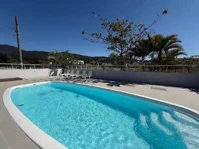 A piscina em ou perto de Cód 79 - Apto com hidromassagem e vista mar