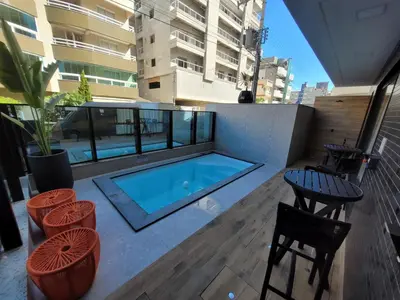 A piscina em ou perto de Cobertura duplex alto padrão 200m da praia