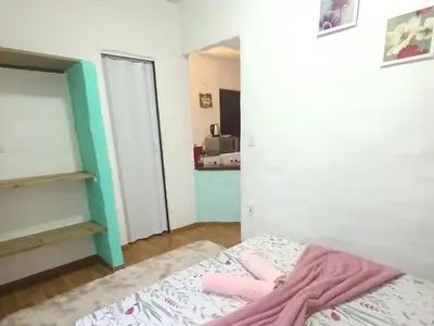 Uma cama ou camas num quarto em Residencial María