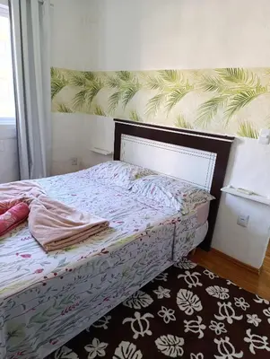 Uma cama ou camas num quarto em Residencial María
