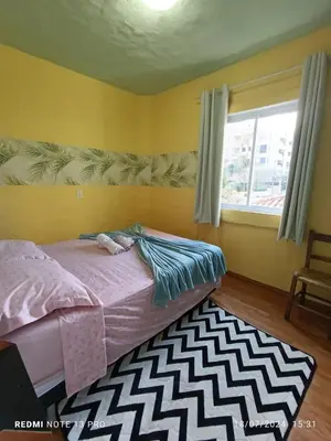 Uma cama ou camas num quarto em Residencial María