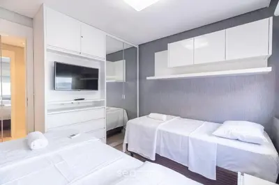 Uma cama ou camas num quarto em VDT - Apartamentos a 180m da Praia de Bombas