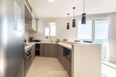 A cozinha ou kitchenette de VDT - Apartamentos a 180m da Praia de Bombas