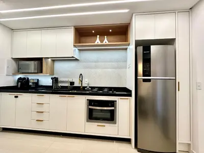 A cozinha ou kitchenette de Apto Itapema NOVO 2 quartos e 2bwc -2 garagens - Prédio com Piscina