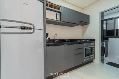 A cozinha ou kitchenette de DRL - Apartamentos a 300m da Praia de Bombinhas