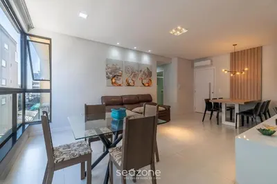 Uma área de estar em DRL - Apartamentos a 300m da Praia de Bombinhas
