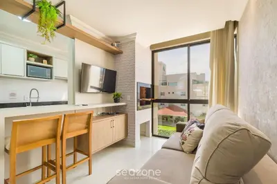 A cozinha ou kitchenette de UML - Apartamentos quadra mar em Bombinhas