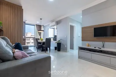 Uma televisão e/ou sistema de entretenimento em UML - Apartamentos quadra mar em Bombinhas