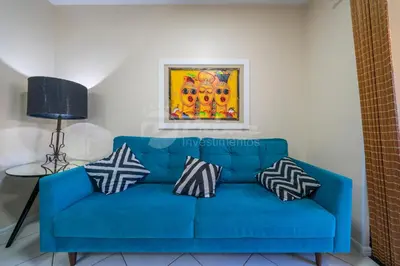 Uma área de estar em Lindo Apartamento a 150m da Praia- Residencial Ilhas do Caribe