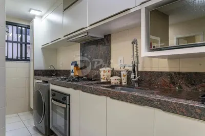 A cozinha ou kitchenette de Lindo Apartamento a 150m da Praia- Residencial Ilhas do Caribe