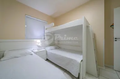 Uma cama ou camas num quarto em Lindo Apartamento a 150m da Praia- Residencial Ilhas do Caribe