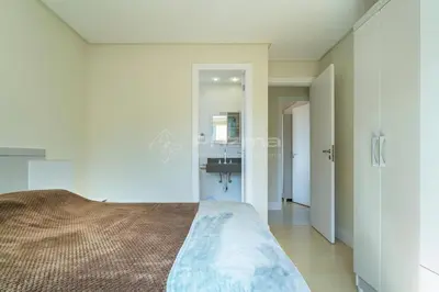 Uma cama ou camas num quarto em Porto Fino 204 - Aconchegante apartamento com 03 quartos com ótima localização