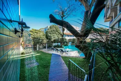 A piscina em ou perto de 304 Bl 03 Waldgarten Bombinhas - Condomínio a 50 m do Mar e Frente Avenida - Condomínio de Alto Padrão - Piscina - Academia - Salão de jogos