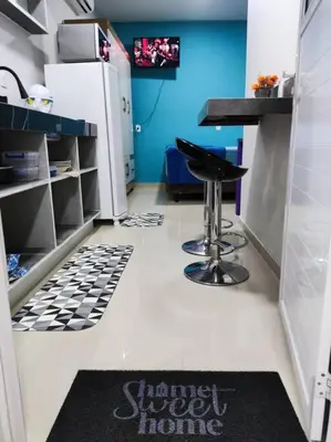 A cozinha ou kitchenette de Loft 1 com ar condicionado prox Praia Laranjeiras facil acesso pela BR101
