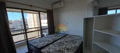 Uma cama ou camas num quarto em Apartamento Alto Padrão Com Vista Mar - 03 Dormitórios Ao Lado de Comércio em Geral