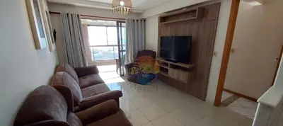 Uma televisão e/ou sistema de entretenimento em Apartamento Alto Padrão Com Vista Mar - 03 Dormitórios Ao Lado de Comércio em Geral