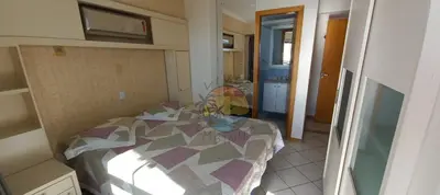 Uma cama ou camas num quarto em Apartamento Alto Padrão Com Vista Mar - 03 Dormitórios Ao Lado de Comércio em Geral