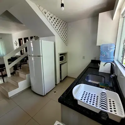A cozinha ou kitchenette de Residencial Chalés Rota do Sol Bombinhas - com cozinha