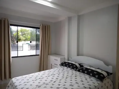 Uma cama ou camas num quarto em Casa 200m da praia, 8 pessoas, piso inferior