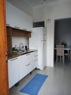 A cozinha ou kitchenette de Casa 200m da praia, 8 pessoas, piso inferior