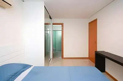 Uma cama ou camas num quarto em Belissimo Apartamento Familiar 450m do Mar