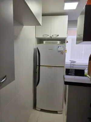 A cozinha ou kitchenette de Apartamento - Praia de Palmas