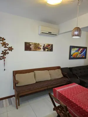 Uma área de estar em Apartamento - Praia de Palmas