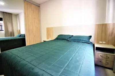 Uma cama ou camas num quarto em Condominio Waldgarten