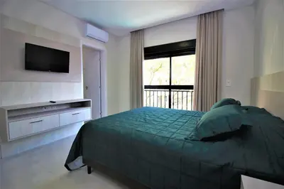 Uma cama ou camas num quarto em Condominio Waldgarten