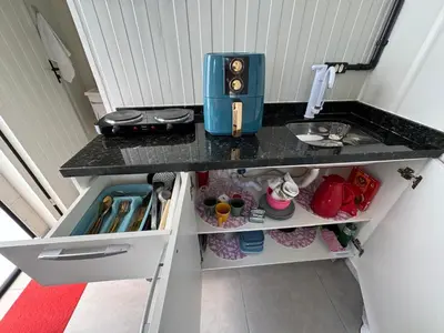 A cozinha ou kitchenette de Charmoso e bem localizado!