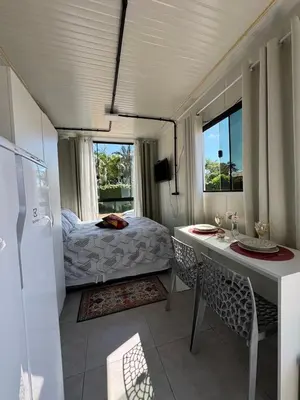 Uma cama ou camas num quarto em Charmoso e bem localizado!