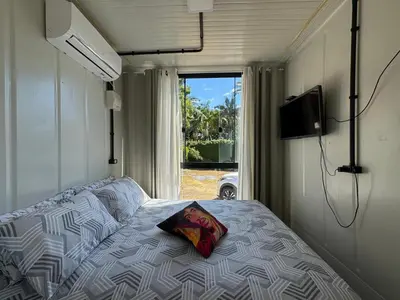 Uma cama ou camas num quarto em Charmoso e bem localizado!