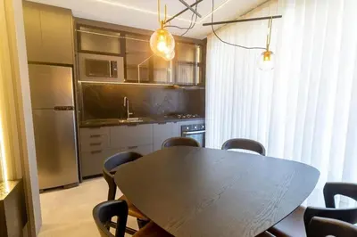 A cozinha ou kitchenette de Solar do Atlântico 102 – Beira Mar em Bombas