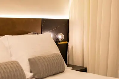 Uma cama ou camas num quarto em Solar do Atlântico 102 – Beira Mar em Bombas