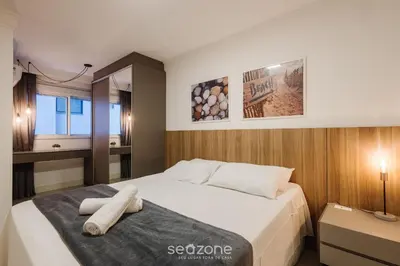 Uma cama ou camas num quarto em Apto 3Q sofisticado apenas 200m da praia SEO0702