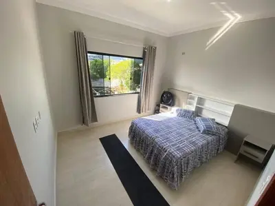 Uma cama ou camas num quarto em Casa 200m da praia, 8 pessoas, piso superior