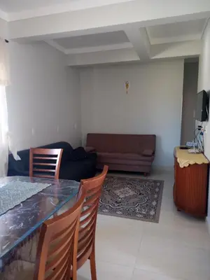 Uma área de estar em Casa 200m da praia, 8 pessoas, piso superior