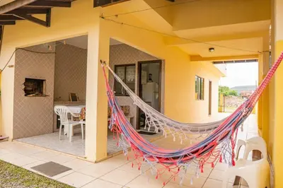 Uma varanda ou terraço em Casa 100m da praia, 10 pessoas, 3 quartos ,,