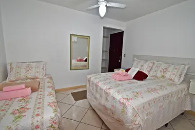 Uma cama ou camas num quarto em Pousada Enseada dos Golfinhos