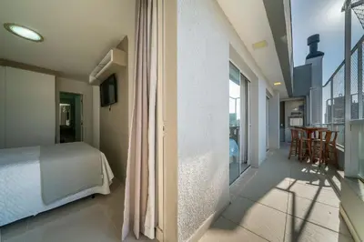 Uma cama ou camas num quarto em Apartamento 2 quartos sendo 1 suíte em Bombas
