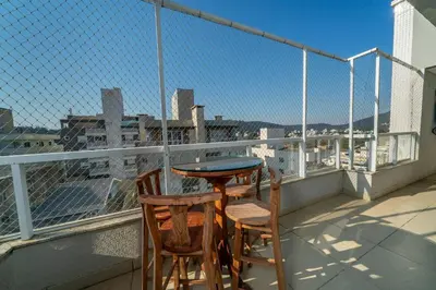 Uma varanda ou terraço em Apartamento 2 quartos sendo 1 suíte em Bombas