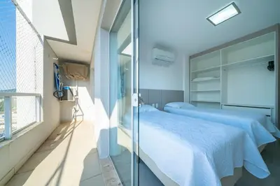 Uma cama ou camas num quarto em Apartamento 2 quartos sendo 1 suíte em Bombas
